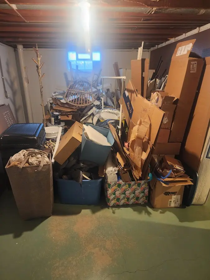 Roll-off dumpster container at job site for 2 Yard Dumpster Rental in Wesley Hills